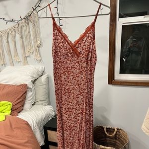Midi length maroon florals dress.